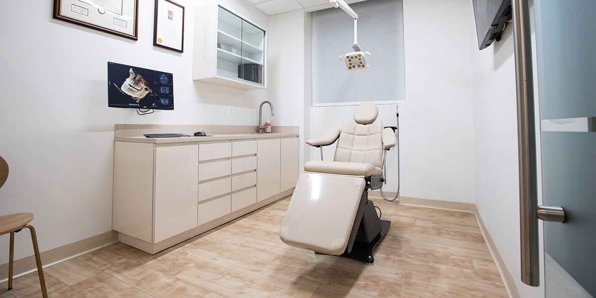 dental exam room with beige chair